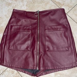 Cute skort, eggplant color with zipper in middle.